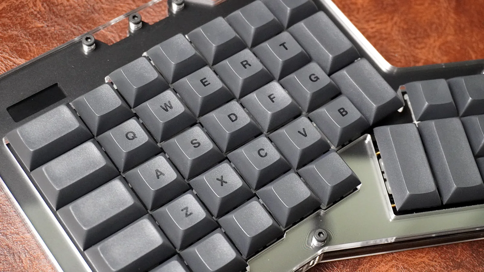 Close-up of dark grey DSA dye-sub PBT keycaps on the ErgoDox 76 Hot Dox V2