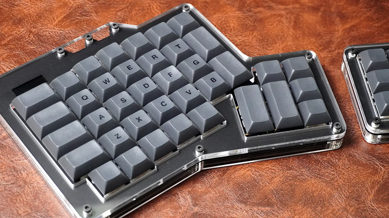 ErgoDox 76 Hot Dox V2 left half showing the layer screen above the number row