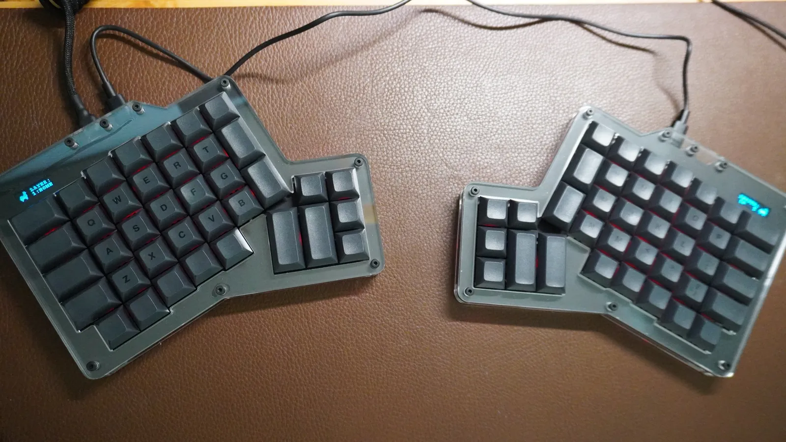 Top-down view of both ErgoDox 76 Hot Dox V2 halves showing the column stagger and a 6-key thumb cluster on each half