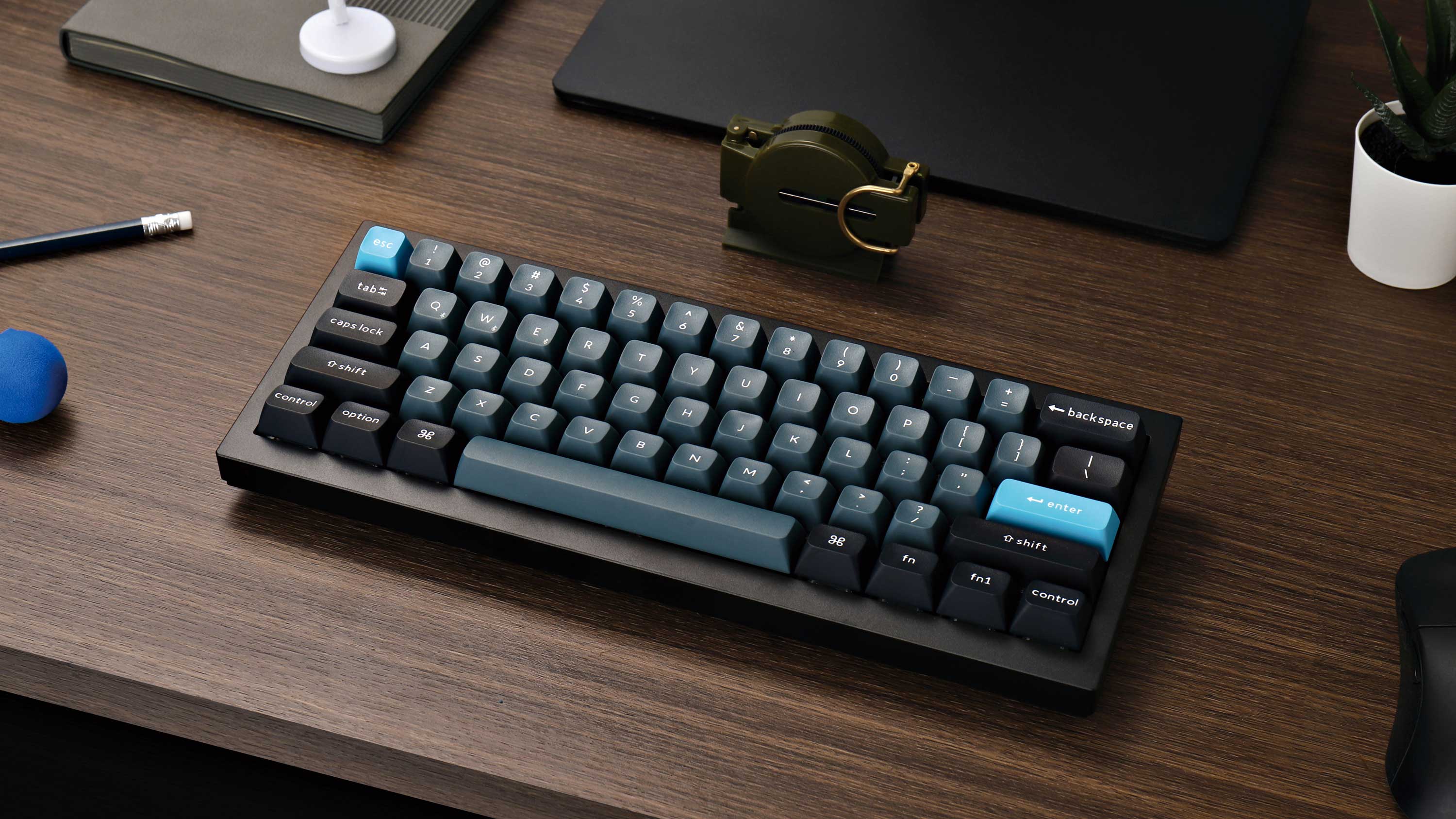 Keychron Q4 Pro wireless mechanical keyboard on a desk in Carbon Black